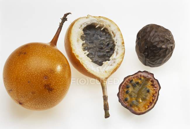 Golden passionfruit and purple — Stock Photo