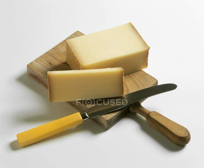 Alpine cheese on board — Stock Photo