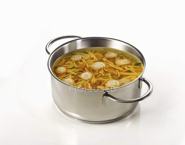 Clear broth with noodles and dumplings — Stock Photo