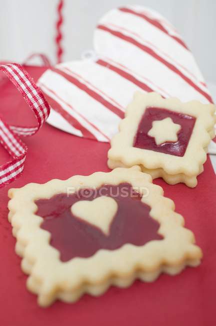 Christmas decorations on red — Stock Photo