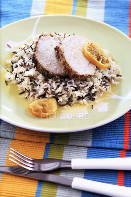 Roasted pork with wild rice — Stock Photo