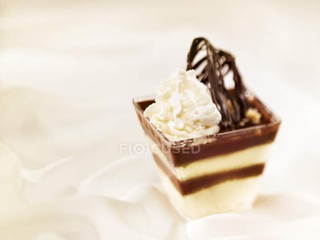 Closeup view of chocolate and cream dessert — Stock Photo