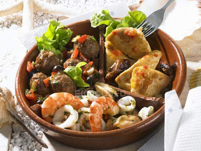 Assorted tapas in bowl — Stock Photo