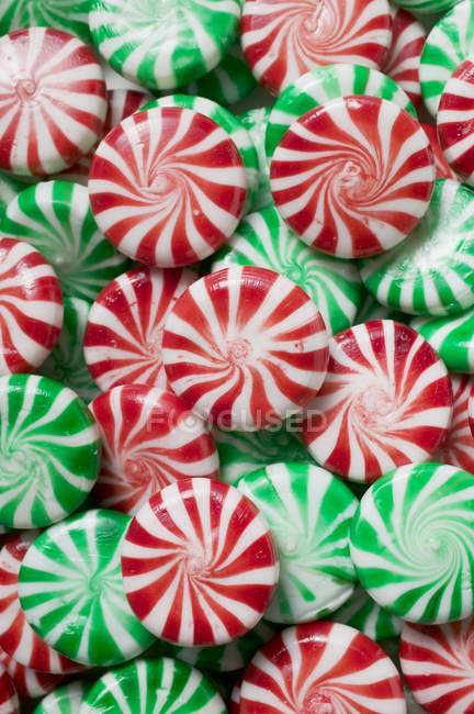 Red and green with white Peppermints — Stock Photo