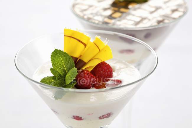 Peach mousse with raspberries — Stock Photo