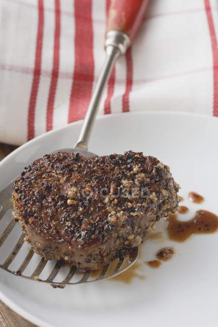 Peppered steak on spatula — Stock Photo