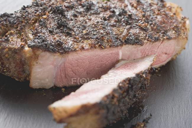 Spicy fried rib eye steak — Stock Photo
