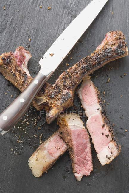 Spicy fried rib eye steak — Stock Photo