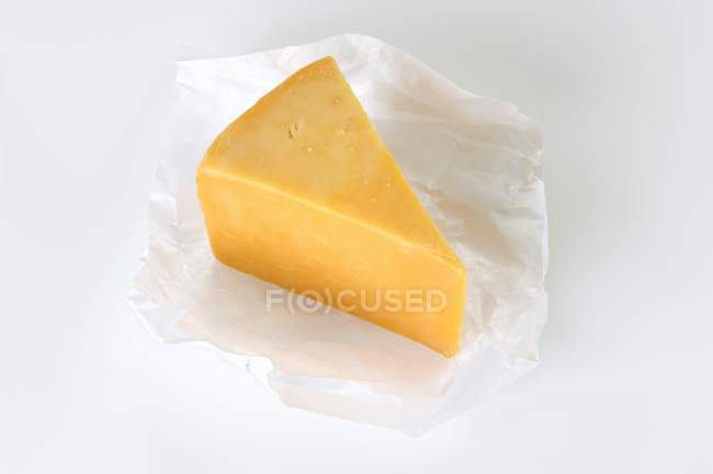 Pedaço de queijo Cheddar — Fotografia de Stock