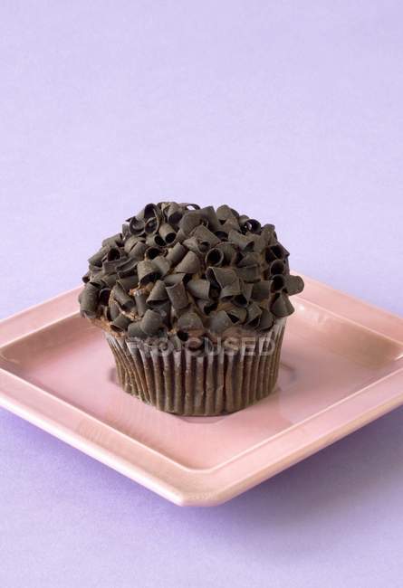 Muffin with Chocolate Curls — Stock Photo