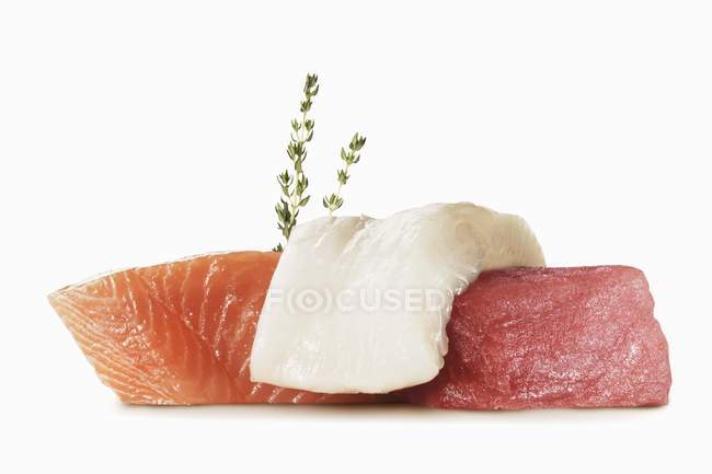 Fresh Fish pieces with Thyme Sprig — Stock Photo