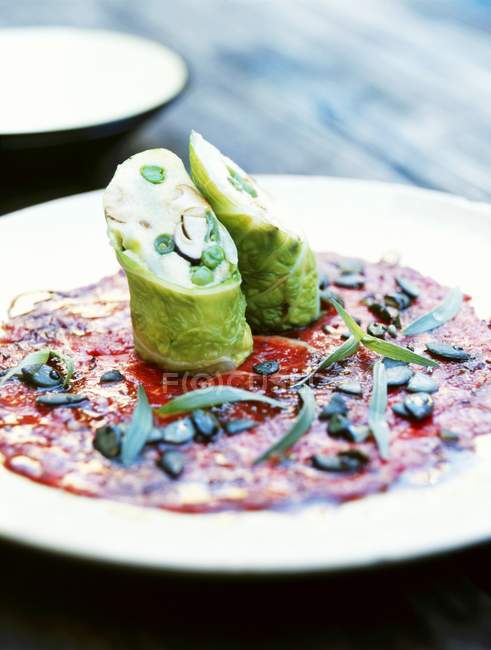 Vegetable polenta wrapped in cabbage — Stock Photo
