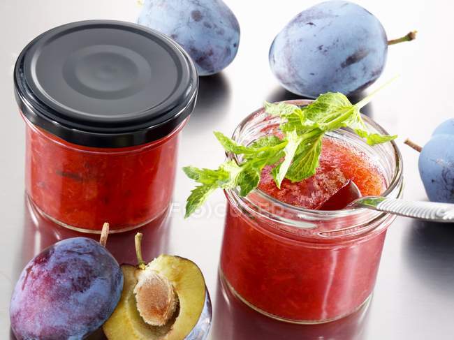 Jars of plum jam — Stock Photo