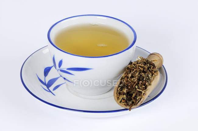Dabdelion tea in the cup — Stock Photo