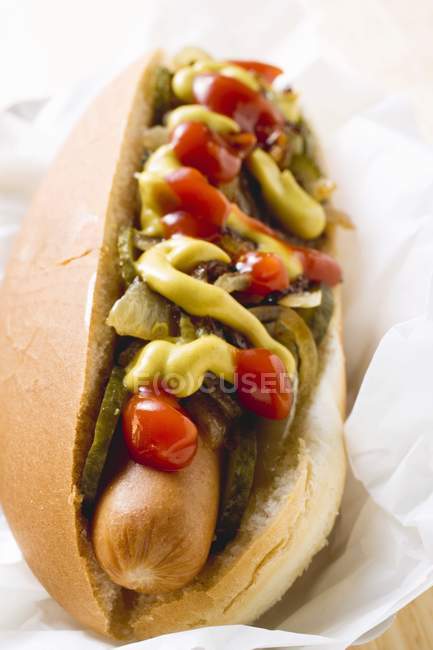 Hot dog with ketchup and mustard — Stock Photo