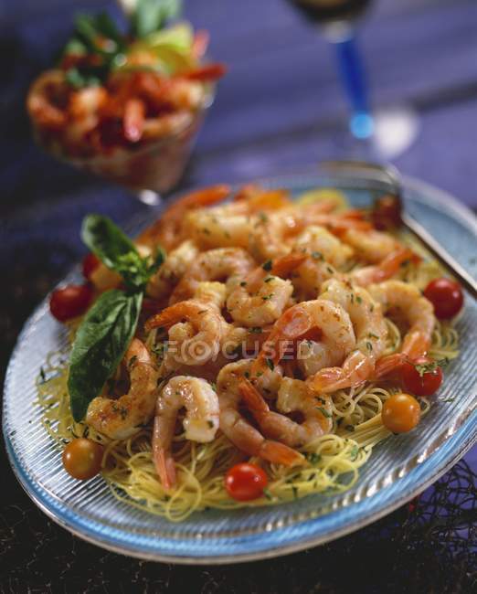 Shrimps and cherry tomato pasta — Stock Photo