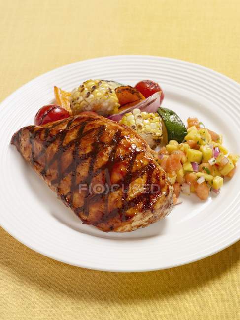 Chicken Breast with Mango Papaya Salsa — Stock Photo