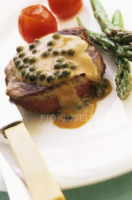 Steak with pepper sauce — Stock Photo