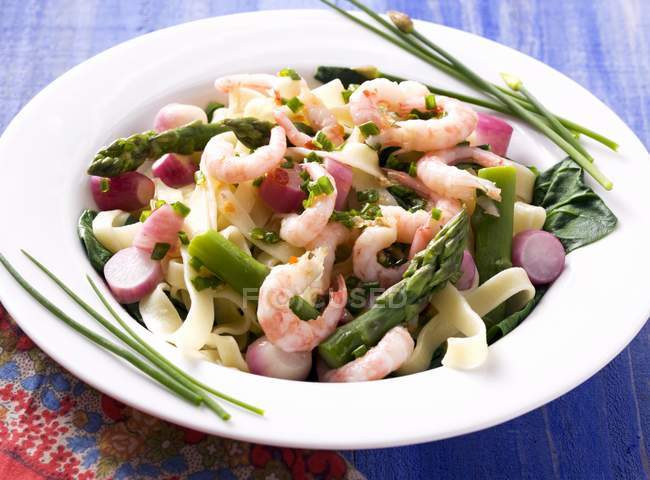 Tagliatelle pasta with prawns — Stock Photo