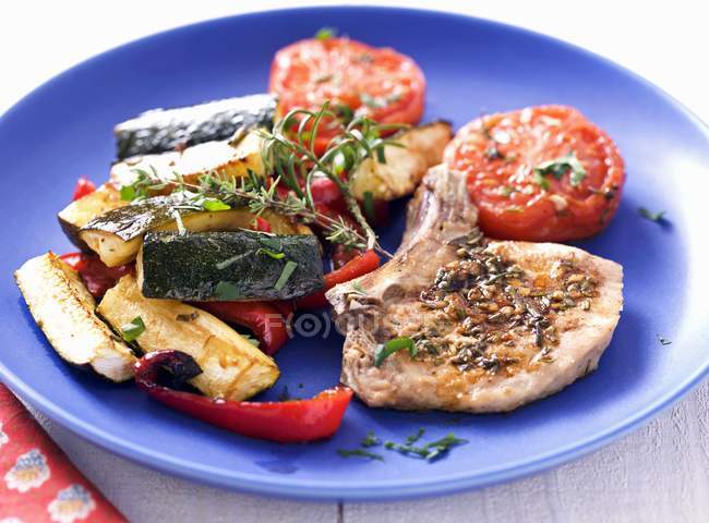 Grilled Pork chops with provencal vegetables — Stock Photo