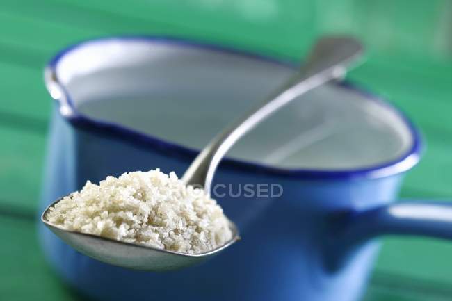 Close up of  Salt on a spoon — Stock Photo