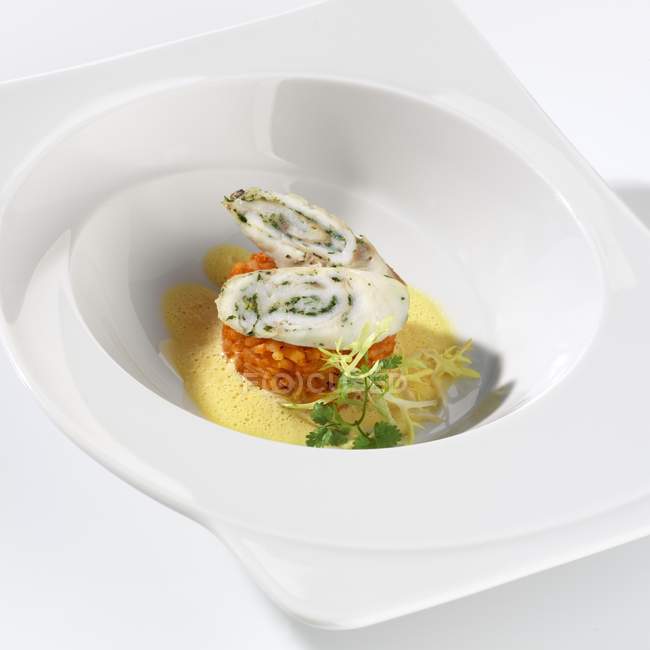 Turbot roulade on pepper rice — Stock Photo