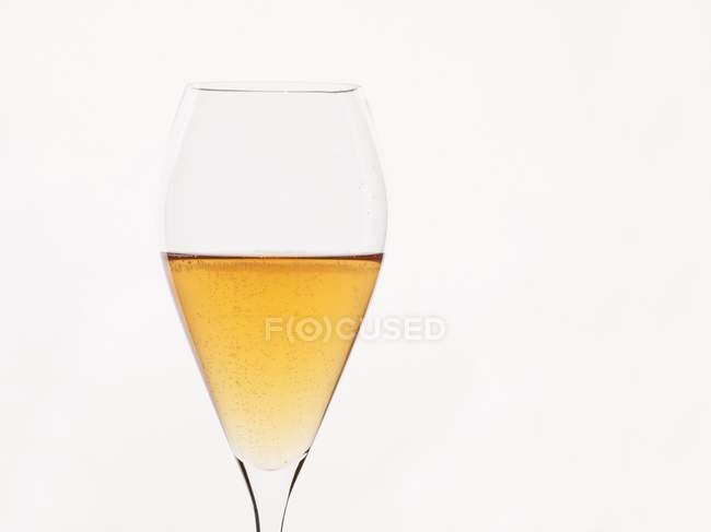 Glass of foamy cider — Stock Photo