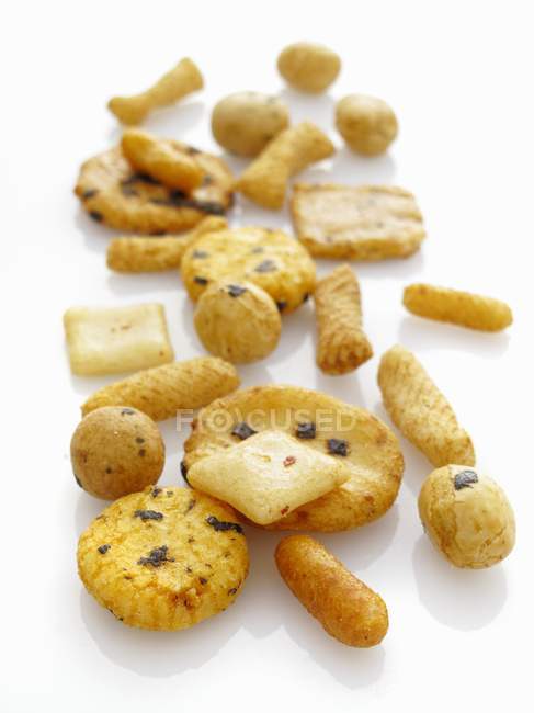 Closeup view of Japanese snacks on white surface — Stock Photo
