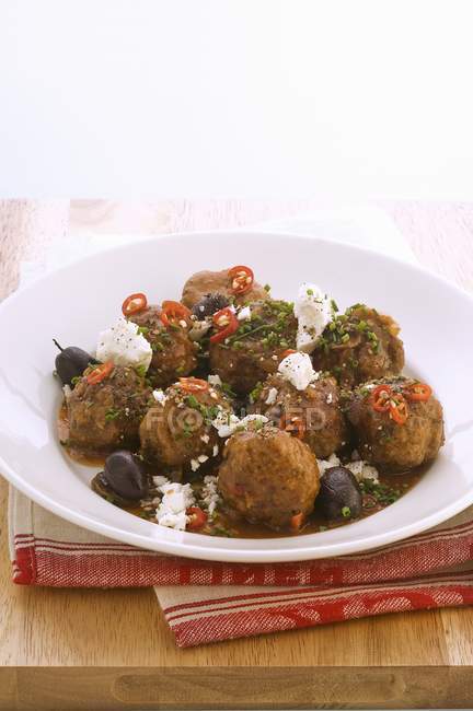 Meatballs with olives and cheese — Stock Photo