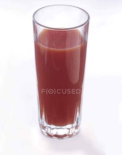 Vaso de jugo de tomate - foto de stock