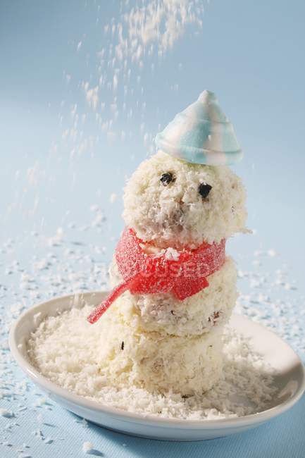 Closeup view of snowman with grated coconut — Stock Photo