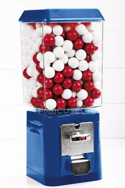 Closeup view of gumball machine with candies — Stock Photo