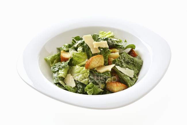 Caesar salad in dish — Stock Photo