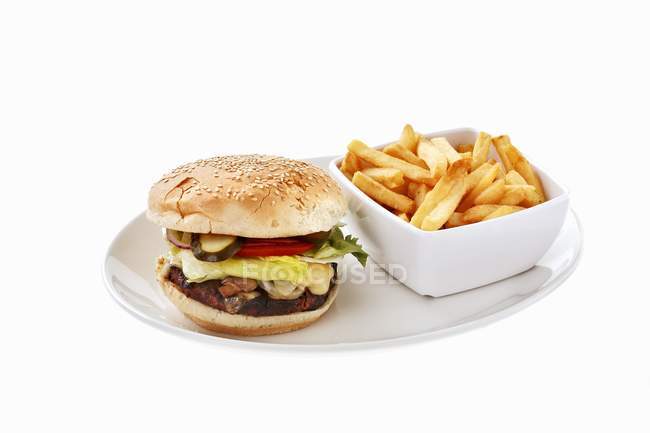 Burger with mushrooms and cheese — Stock Photo