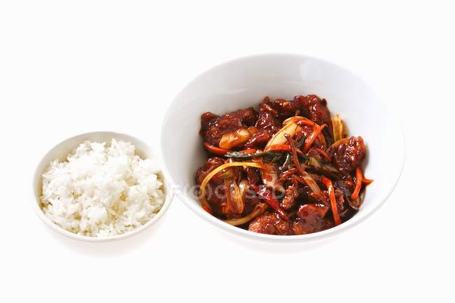 Crispy beef with vegetables and rice — Stock Photo