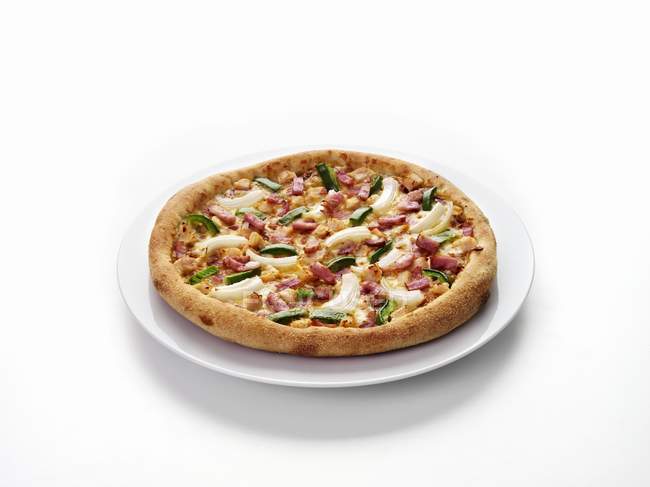 Jamón y pimienta pizza - foto de stock