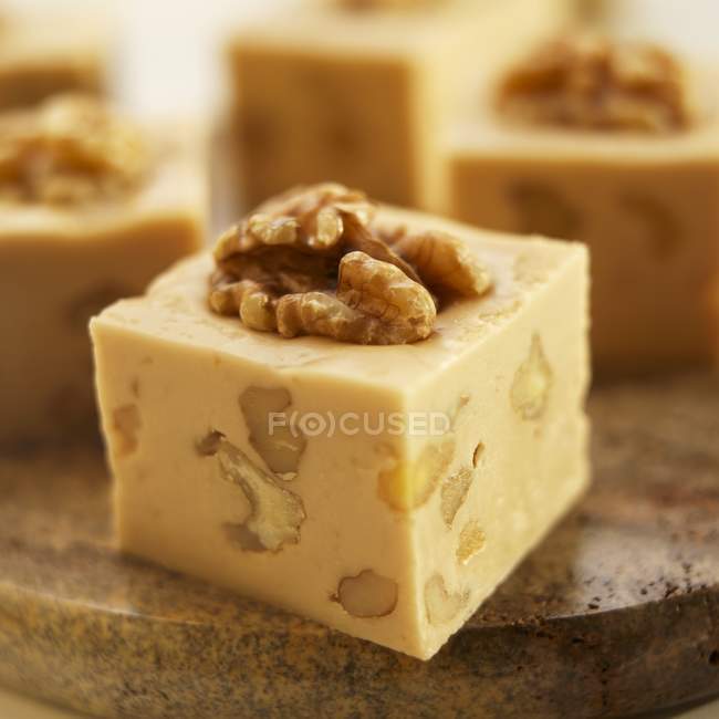 Closeup view of maple walnut Fudge on marble cutting board — Stock Photo