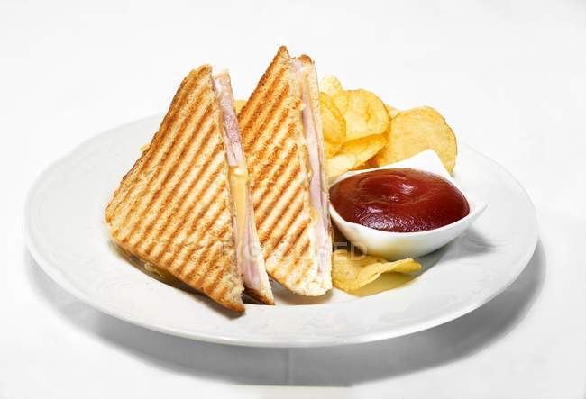 Toasted ham and cheese sandwiches — Stock Photo