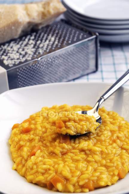 Pumpkin risotto rice and Parmesan — Stock Photo