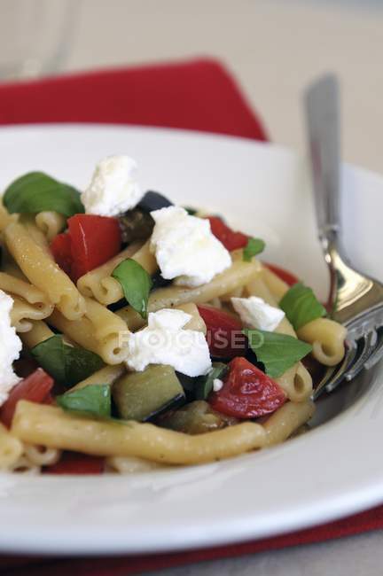Pasta with tomatoes and ricotta cheese — Stock Photo