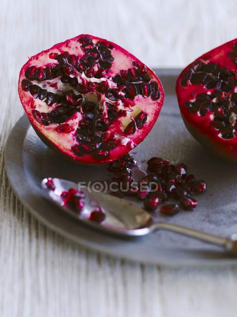 Fresh halved pomegranate — Stock Photo
