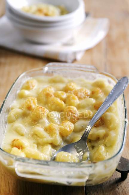 Oven dish of potato gnocchi — Stock Photo