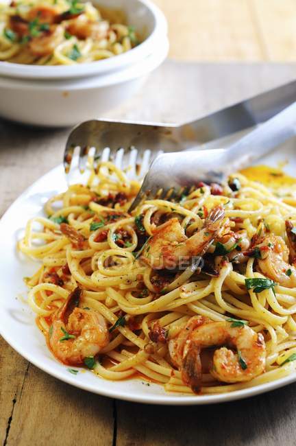 Linguine pasta with spicy tomato sauce — Stock Photo