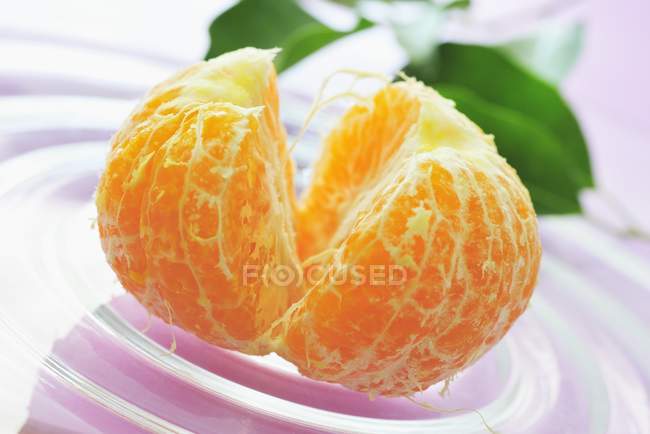 Mandarina pelada naranja - foto de stock