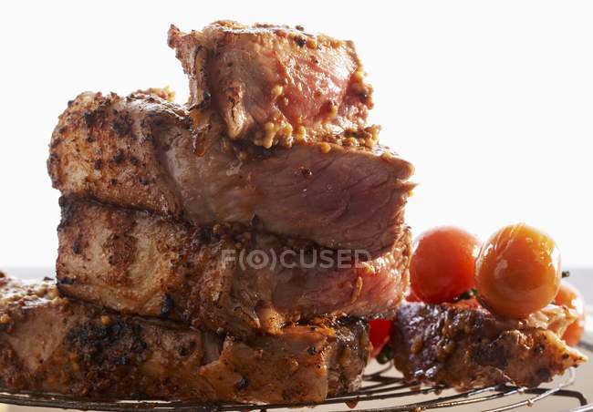 Beefsteak with cherry tomatoes — Stock Photo