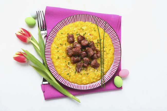 Saffran risotto rice with salsiccia — Stock Photo