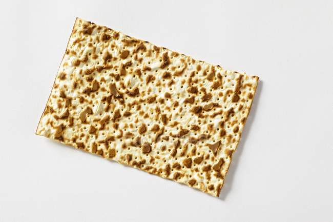 Jewish flatbread on white — Stock Photo