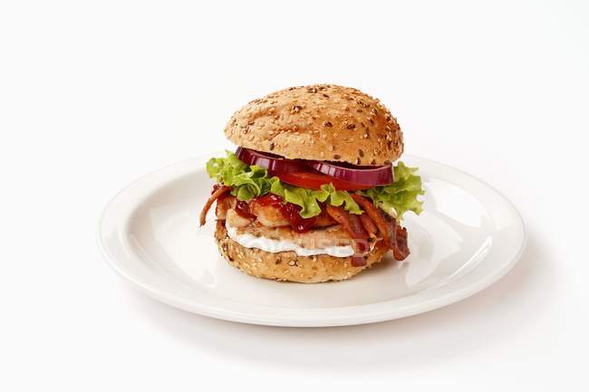Chicken burger with bacon — Stock Photo
