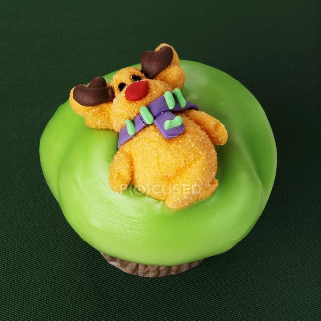 Cupcake with reindeer decoration — Stock Photo