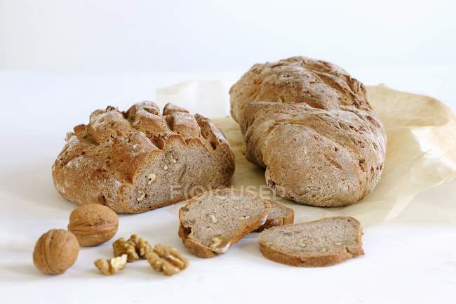Walnut bread and walnuts — Stock Photo